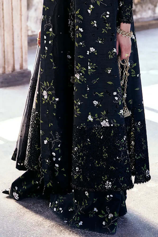 Zeyara raven black silk outfit featuring intricate floral embroidery and lace details.
