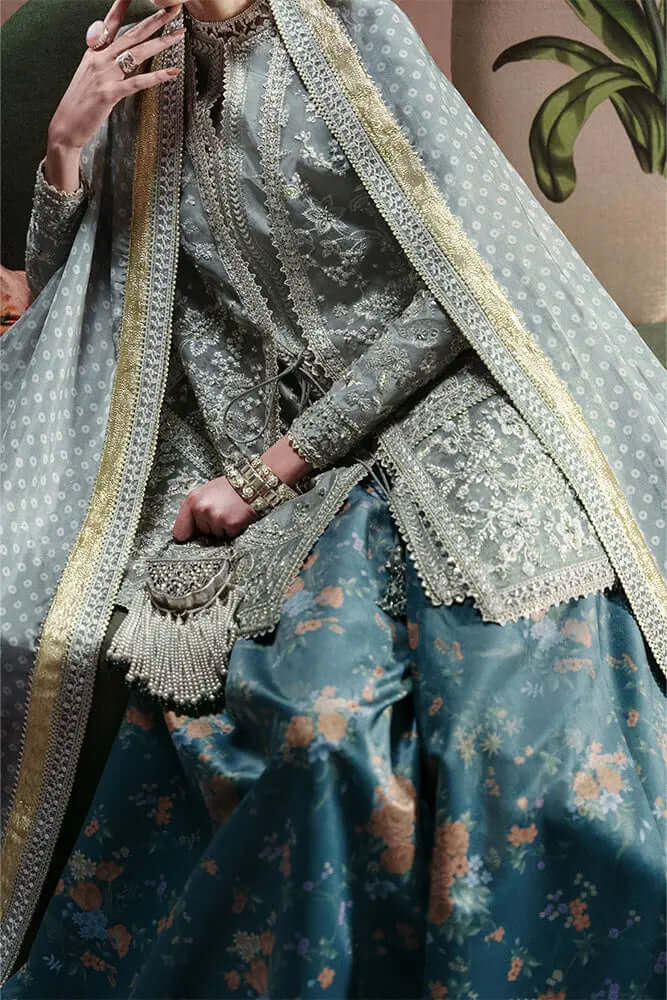 Selineh double shirt outfit featuring a grey organza jacket, blue floral skirt, and intricate embroidery.