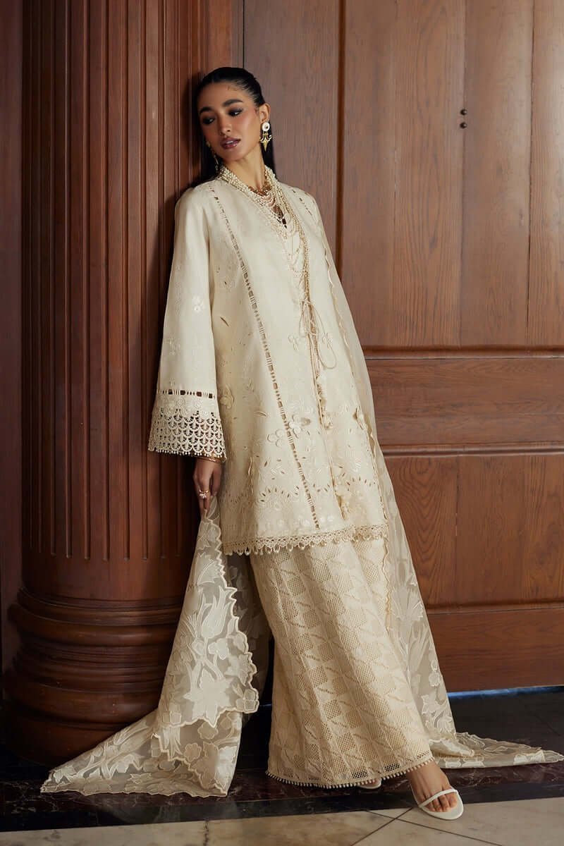 Elegant off-white Liza shirt with 3D embroidery, paired with chic embroidered Azar pants and organza dupatta.