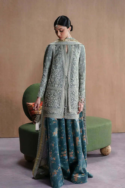 Selineh elegant outfit featuring a double shirt and skirt in Oyster Bay Green with intricate embroidery and velvet details.