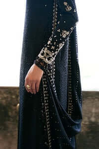Vivora midnight black silk shirt with embroidered sleeves and tassels, showcasing intricate details and elegant design.