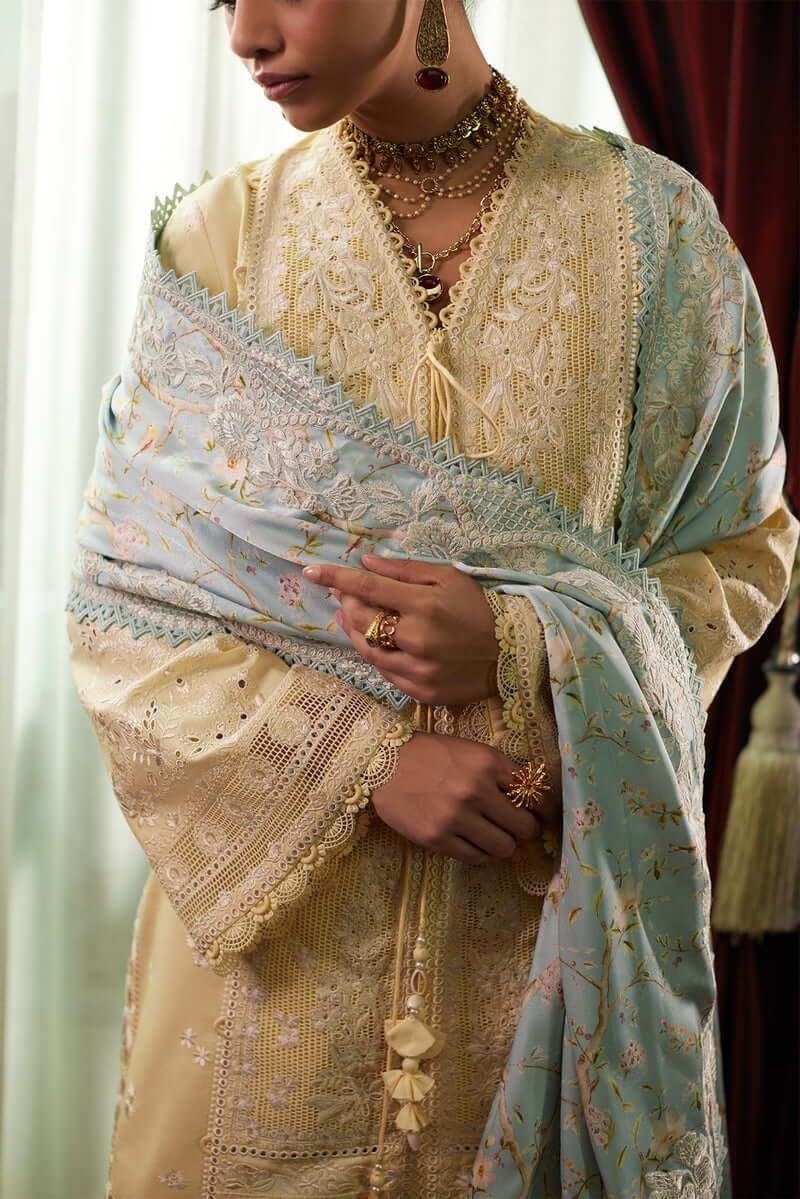 Daneen butter yellow shirt with ice blue silk dupatta featuring intricate embroidery and elegant styling for special occasions.