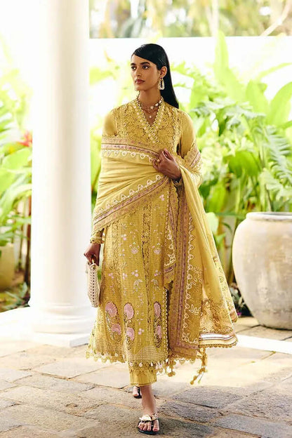Model wearing a honey yellow Angrakha style shirt with embroidery and lace accents, featuring the Zorah design.