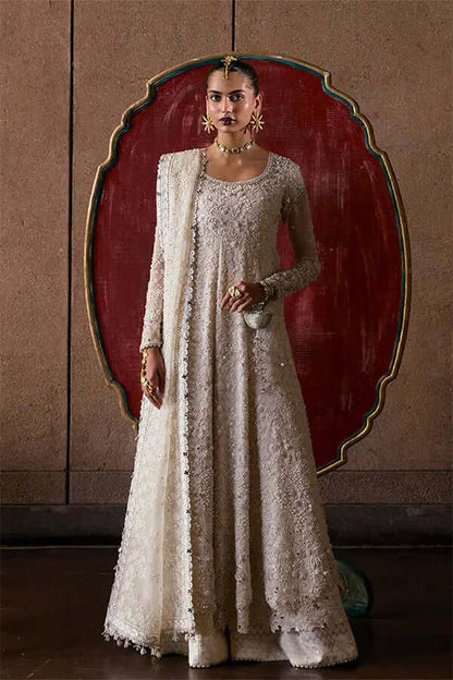 Zehrell white organza pishwaas with scoop neckline, scalloped hem, and organza dupatta with sequins.