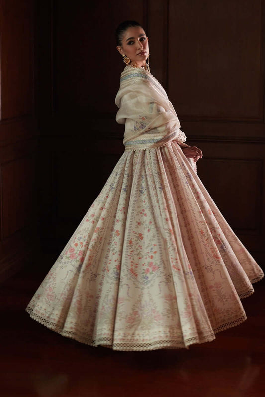 Safira elegant pishwas dress with floral prints and embroidered organza dupatta, perfect for festive occasions.