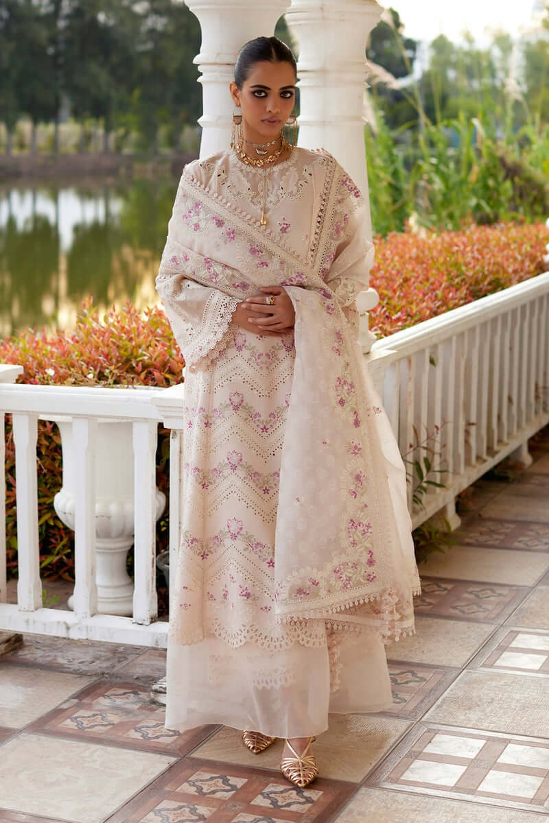 Melina elegant powder pink kurta with embroidery, paired with organza dupatta and culottes for special occasions.