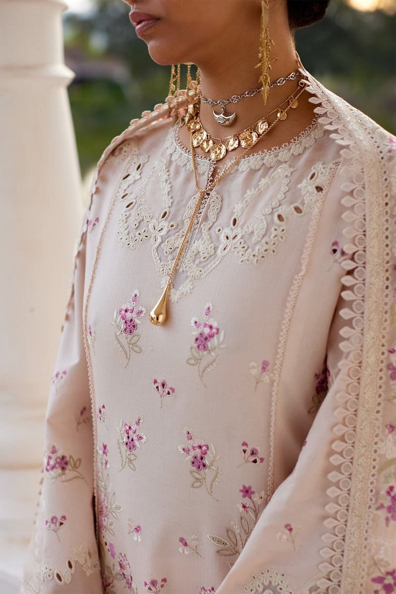 Melina powder pink kurta with embroidered details and elegant accessories, ideal for special occasions.